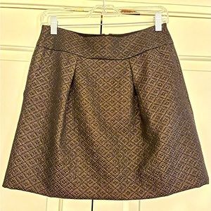 NWOT black with gold shimmer mini skirt